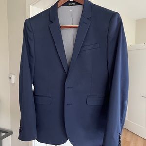 Men’s navy blue suit jacket and pants